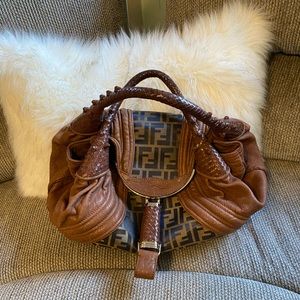 Authentic Beautiful FENDI spy bag. The sticker fell off but it is in the bag.